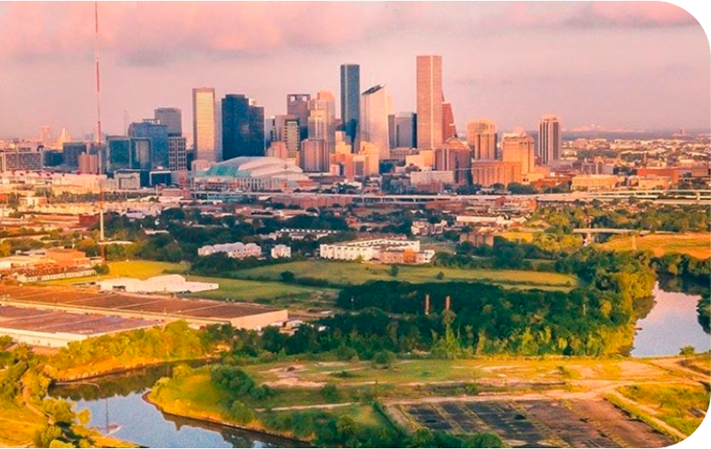 wide angle photo of Houston’s skyline during the day