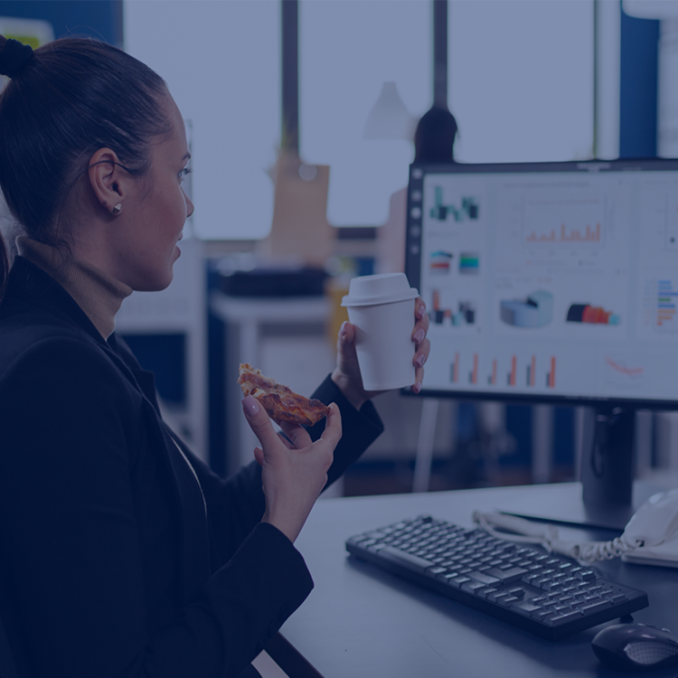 business woman holding a cup & food